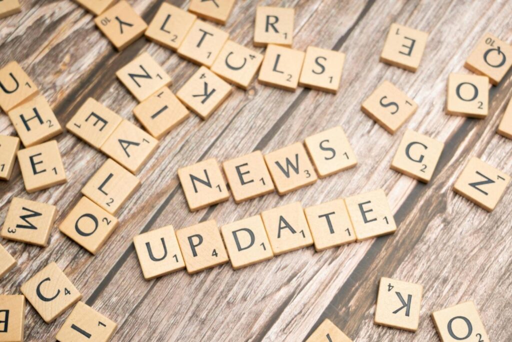 "News update" written in Scrabble tiles